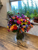 Lush and full cut flower arrangement in a 6x8 inch Gathering Vase with Colorado field grown flowers and South American flowers