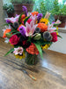 Lush and full cut flower arrangement in a 6x8 inch Gathering Vase with Colorado greenhouse and field grown flowers and South American flowers