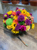 Lush and full cut flower arrangement in a 6x6 inch cylinder with South American flowers